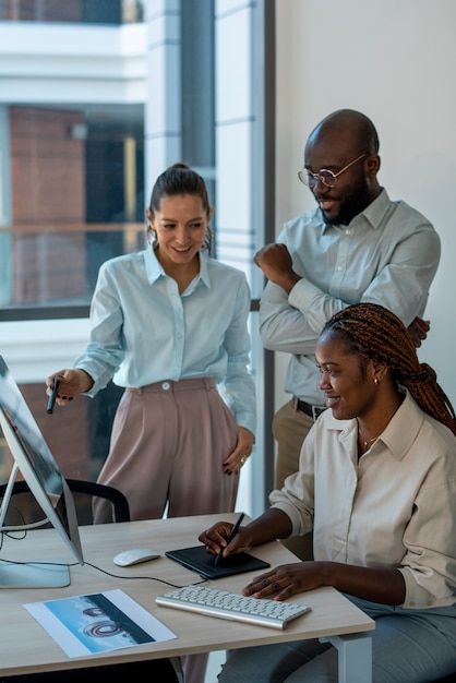 African startup founders collaborating in a co-working space